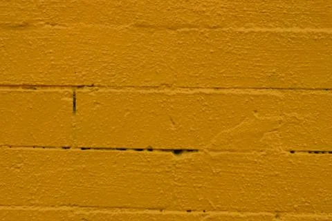 Painted Yellow Brick Wall Stock Photos