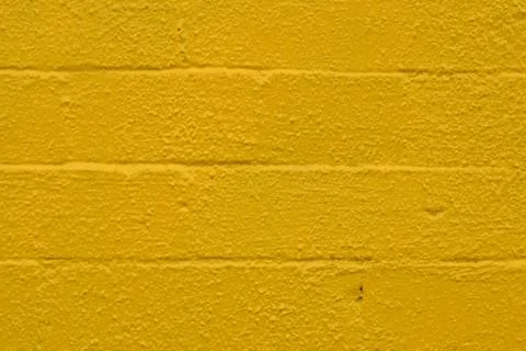 Painted Yellow Brick Wall Stock Photos