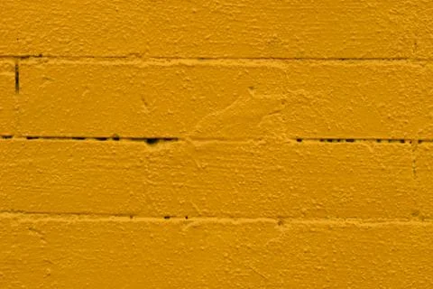 Painted Yellow Brick Wall Stock Photos