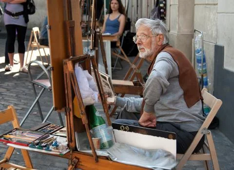 Painter and His Easel at Place du Tertre in Montmartre of Paris Stock Photos