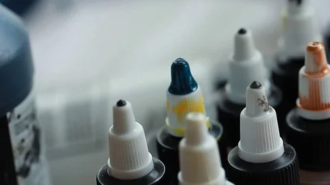 Painter In Art Studio ink and Paint Brushes Stock Footage 71965161