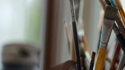 Painter In Art Studio ink and Paint Brushes Stock Footage 71965266