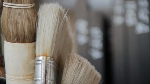 Painter Brushes Detail Shot over Slider Stock Footage 110480103