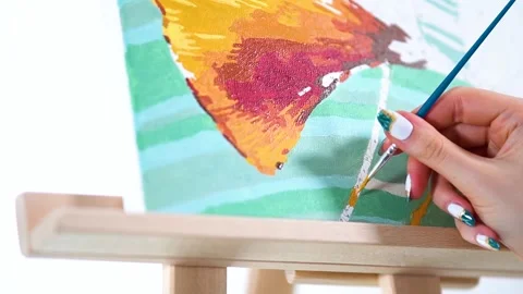 Painter Brushing Gold Paint To The Stem Of The Ginkgo Leaf, Painting By Stock Footage 196990452