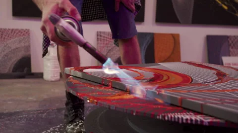 A painter is burning a picture Stock Footage 155241692