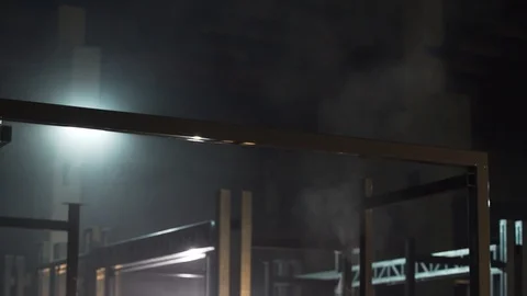 The painter covers the metal frame with paint Stock Footage 124212595