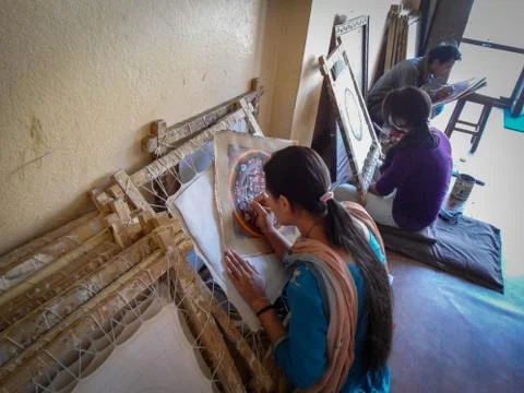 Painter doing a mandala drawing Stock Photos