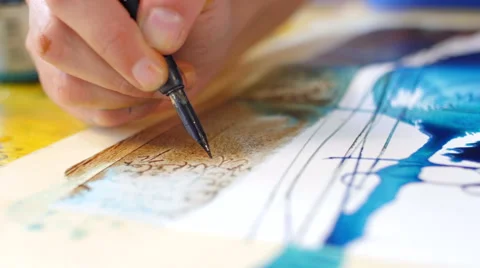 Painter drawing calligraphy on water color amazing artwork hand closeup Stock-Footage 59221662