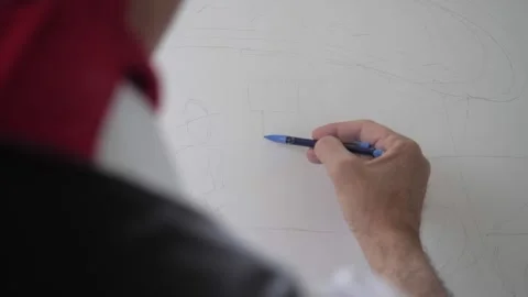 The painter is drawing with pencil Video stock 262748312