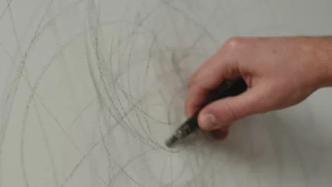 Painter hand drawing lines by pencil on canvas, shading graphite draft. Closeup Video stock 172523832