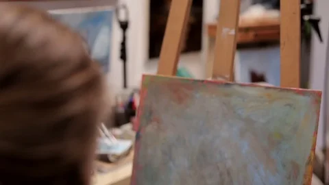 Painter In Her Studio Mixing Oil Colors Stock Footage 83909811