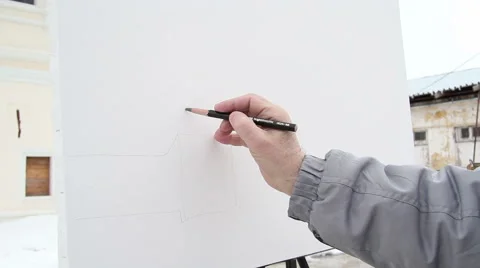 Painter makes a sketch on the canvas Stock Footage 61572419