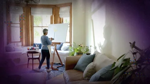 Painter making first stroke stepping back, refining while X shapes, dot patterns Stock Footage 333255751