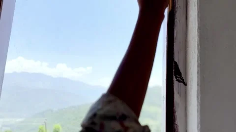 Painter Painting Window and Wall of Newly Constructed House Stock Footage 339530469