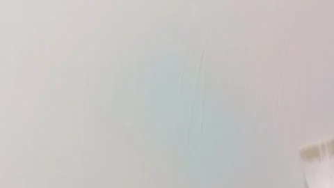 The painter paints with a pink brush. Stock Footage 277340116