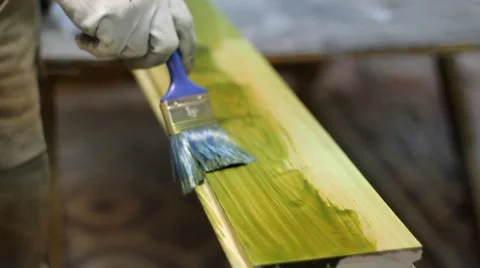 The painter paints the tree Stock Footage 51553693