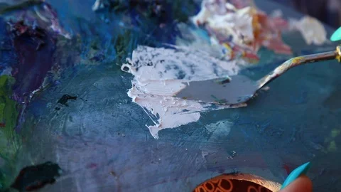 Painter palette knife moving closeup background Stock Footage 94908615