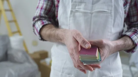 Painter picking a color for your house walls Stock Footage