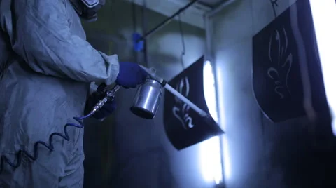 Painter in a protective suit and mask in a special room Stock Footage 60470752