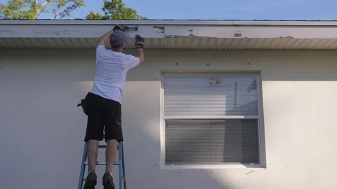 Painter Scraping before Home Improvement Project Stock Footage 95485238
