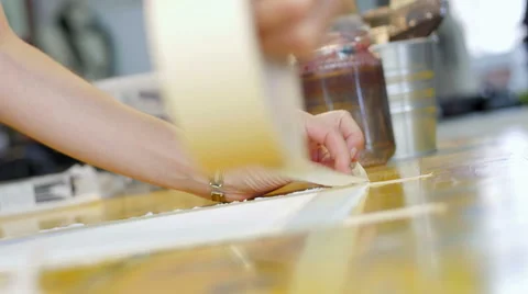 Painter setting up tape closeup Stock Footage 59228395