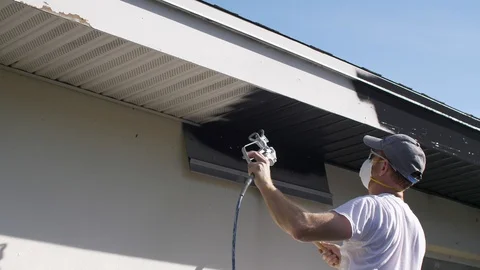 Painter Sprays on Painth with Motorizes Painter Stock Footage 95489915