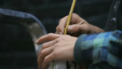 Painter Stirring a Black Paint in a Jar On the Street Video stock 86236208