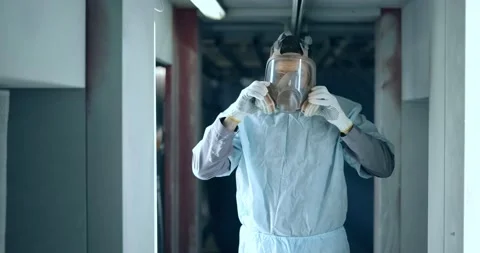 Painter taking off his protective mask Stock Footage 147272366
