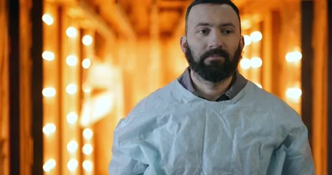 Painter taking off his protective mask Stock Footage 147273907