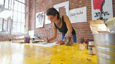 Painter working in her beautiful wide slide Stock Footage 59243953
