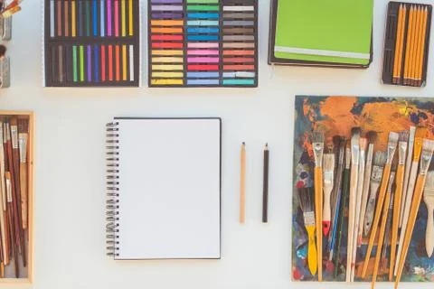 Painter workplace in order side view. Designer desk with drawing equipment. Home Stock Photos