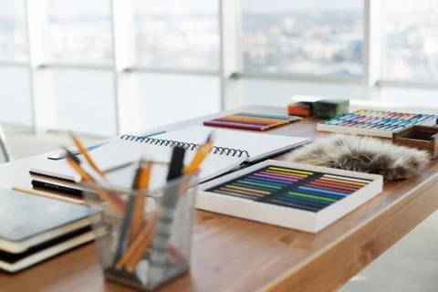 Painter workplace in order side view. Designer desk with drawing equipment. Home 스톡 사진