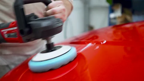 The painter in the workshop smeared the circle of the paling machine with a Video stock 193520033