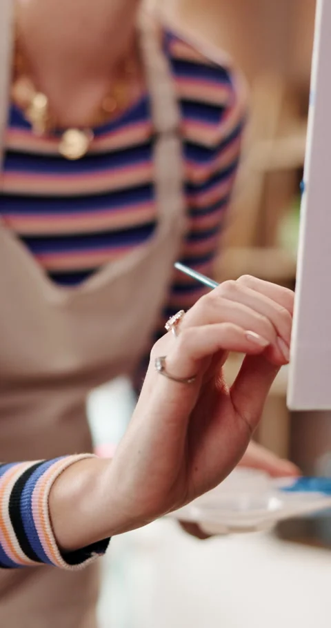 Painter, wrist and hands with brush, stretching or creative with color for Stock Footage 327965461