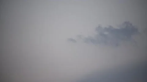 Painterly clouds against a gray sky 01 Stock Footage 145848674