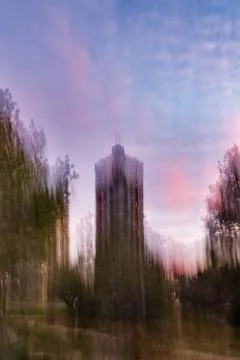 Painterly ICM Effect of a High-Rise Building at Sunset Fotos de archivo