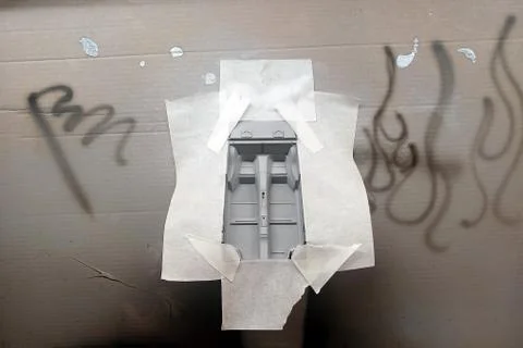 Painting the cabin when assembling a scale model of a toy car. Stock Photos