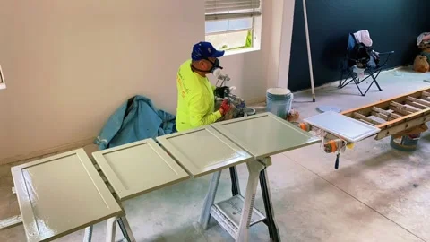 Painting cabinets Stock Footage 300376006