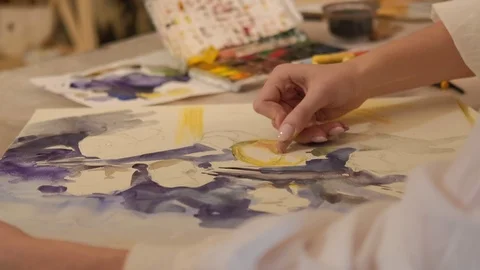 Painting class hand creating abstract artwork Stock Footage 125911086