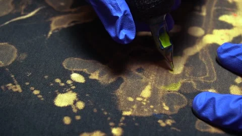 Painting clothes with acrylic paints Stockbeeldmateriaal 292767553