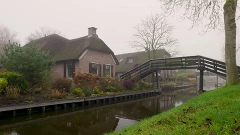Painting Depicts Tranquil Rustic Environment Featuring Wooden Arched Bridge And Stock-Footage 325452790
