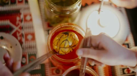 Painting on Easter egg by the sketch Video stock 61845800