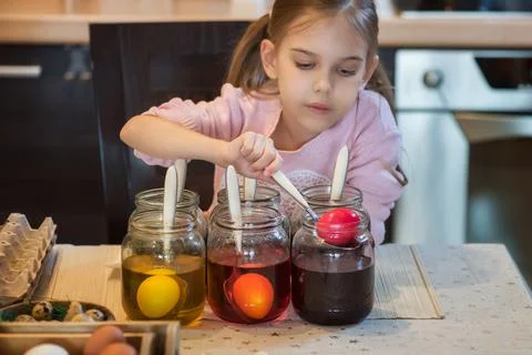 Painting Easter eggs Stock Photos
