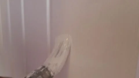 Painting interior door - close up Stock Footage 244595882