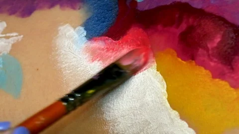 Painting on models body with brush. Macro footage of art bodypainting. Stock Footage 103440419