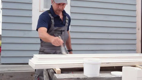 Painting ornaments for the cottage Stock Footage 74205809