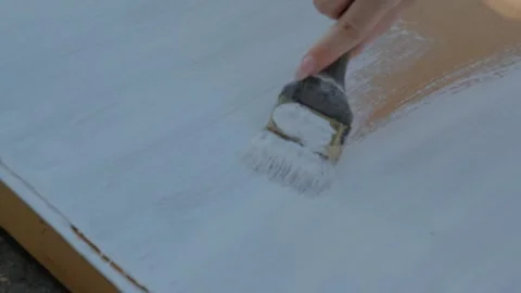 Painting process during renovation. The process of painting with white paint Stock Footage 264062209