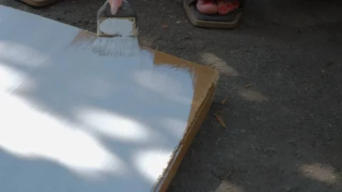 Painting process during renovation. The process of painting with white paint Stock Footage 264541159