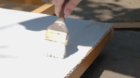Painting process during renovation. The process of painting with white paint Stock Footage 264949404
