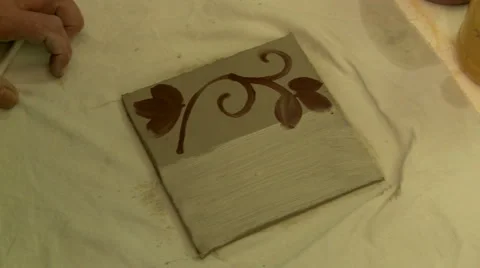 Painting of self-made ceramic tile, close-up Stock Footage 67506138